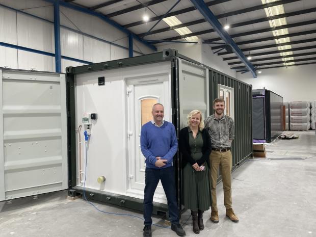 Hampshire Chronicle: From left to right: Sam Whitworth, Maddie Podstada and Jordan Griffith in front of the prototype unit 