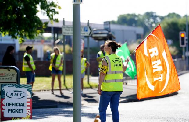 Hampshire Chronicle: RMT members on a picket line (PA)