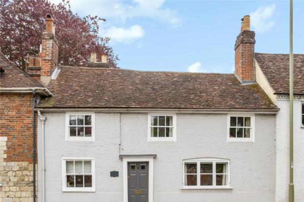 Mid-terrace Winchester cottage that dates back to the 15th century has gone up for sale for £850,000. Credit: Hamptons