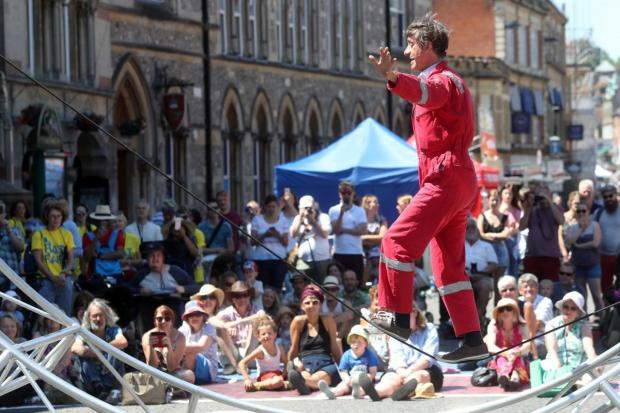 George Orange entertains the crowd at a previous festival with his balancing act