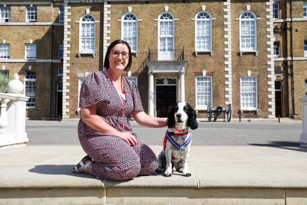 Hampshire Chronicle: Michelle Sutherland and Clive, her medical alert assistance dog (PDSA/PA)