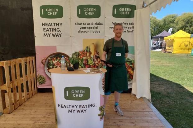 Hampshire Chronicle: Bradley Hyd from Green Chef on day one of Winchester Foodies Festival. July 15 2022