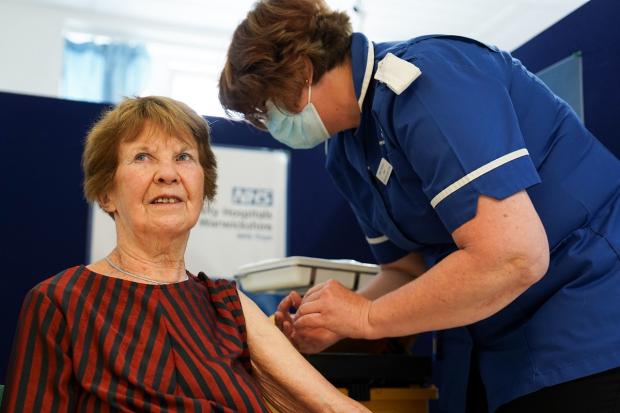 Hampshire Chronicle: Margaret Keenan, 92, receives her spring Covid-19 booster shot at University Hospital Coventry. Picture: PA