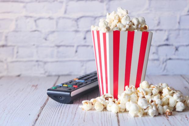 Hampshire Chronicle: A box of popcorn and a TV remote (Canva)