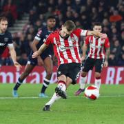 Southampton's James Ward-Prowse scores Saints' second goal during the FA Cup match between Southampton and West Ham at St Mary's Stadium. Photo: Stuart Martin.