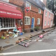 Smashed railings outside Hursley Post Office