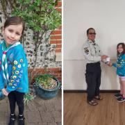 Seven-year-old girl celebrates as she achieves all Beaver Scout activity badges