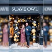 Suave Owl founders Anthony and Jessica celebrate five years of Suave Owl outside their Bath location