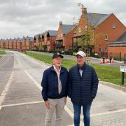 Mike Slinn (left) and Nigel Palmer on Winchester Avenue, Kings Barton. They oppose the diversion plan