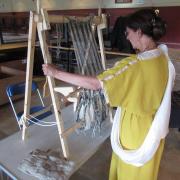 Dr Carey Fleiner at work on her loom