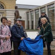 A new information board explaining the significance of Licoricia of Winchester to the city's history has been unveiled next to the statue of her likeness.