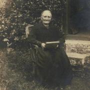 Olive Jacobs outside her cottage in Michelmersh