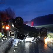 Flipped car on A32