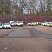 Police cars in the depot in Barfield Close