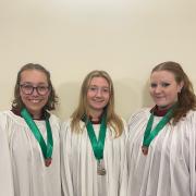 Left to Right : Deputy Head Chorister Eleanor Wallace, Head Chorister Francesca Clarke, and Deputy Head Chorister Sydney Whiteland-Smith
