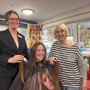 Gillian Swaby went hands-on to help cut 13 inches (33 cm) of Laura Sheldrake’s hair alongside home manager Vanda Baker
