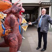 Liberal Democrat leader Sir Ed Davey is greeted by supporters as he arrives to join local Lib Dems celebrating election success