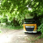 New photos show lorry stuck in tree branches near Winchester