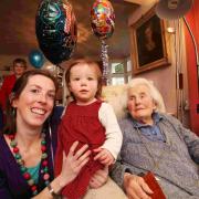 Diana Fawkes celebrating 100 years with her granddaughter Jo Jo Grebert and great-granddaughter Tasmin