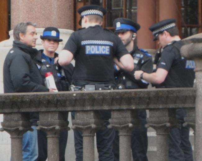 Officers arrest Paul Weston outside Winchester Guildhall