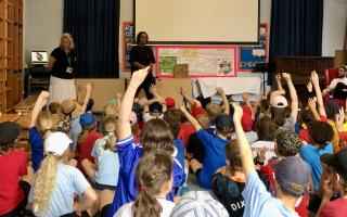 Ex-pupil Charlie Webster visited the school as pupils raised money for UNICEF