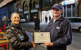 Winchester Street Pastor Mark Hibbert-Hingston presents award to Sarah Jane  Howard