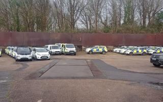 Police cars in the depot in Barfield Close
