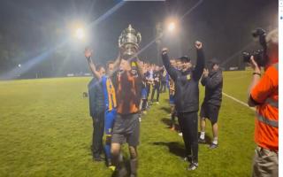 Paul Strudley lifting the trophy for Basingstoke
